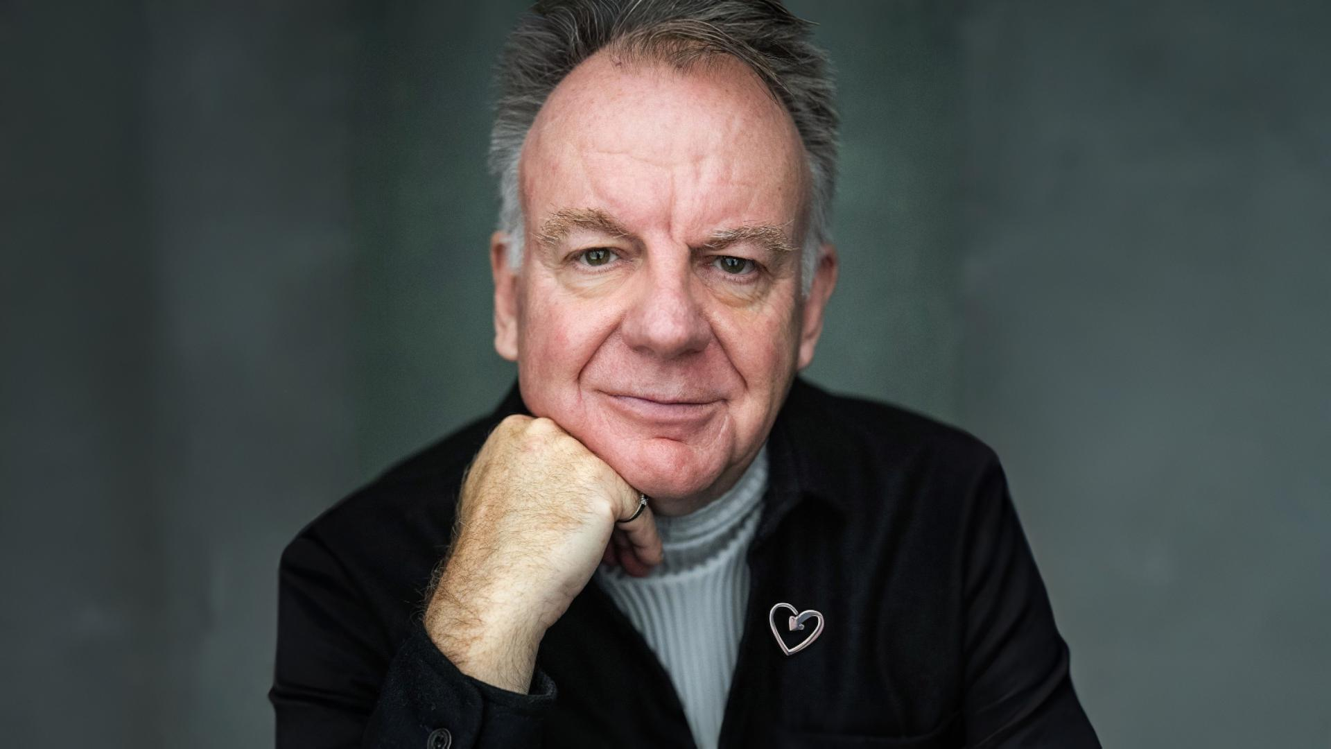 Paul Clayton wearing a heart badge
