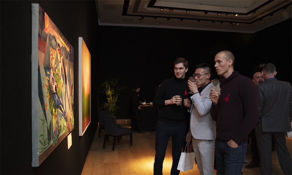 The Auction 2022 men looking at artworks