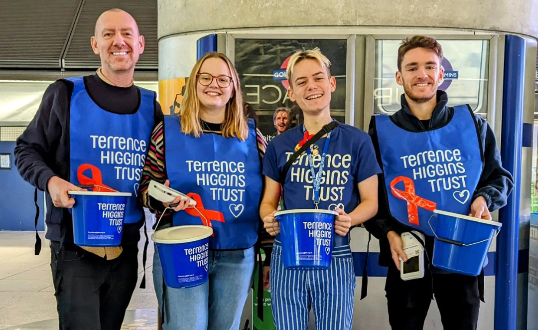 Bucket collection by four Terrence Higgins Trust people at Canary Wharf station