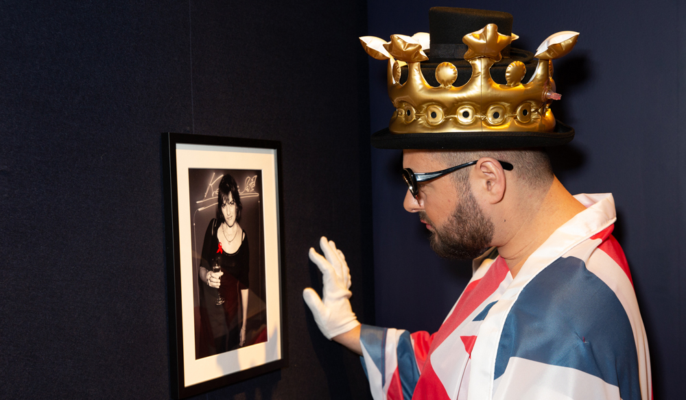 The Auction 2022 - man looking at art