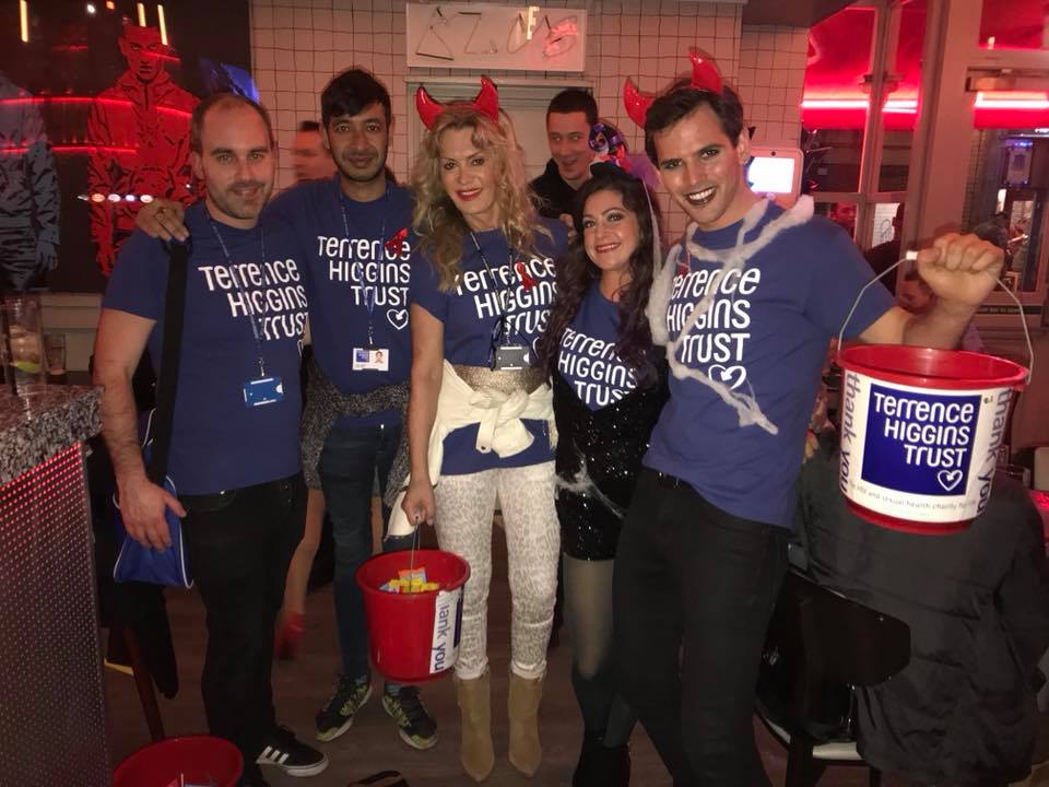 Volunteers fundraising in a bar