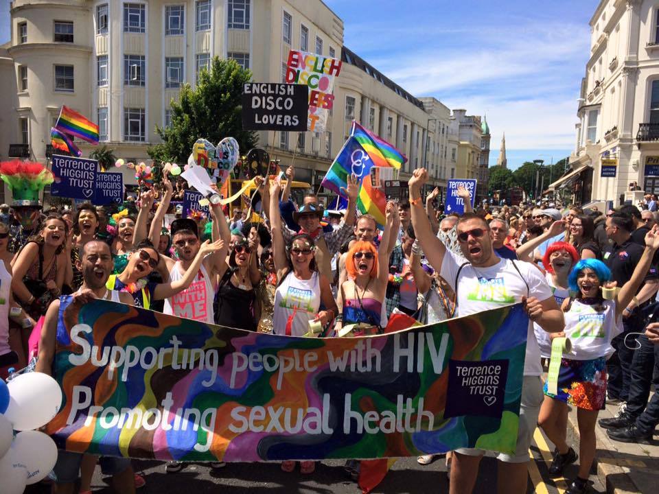 Crowd of people behind banner at Brighton Pride Crowd of people behind banner at Brighton Pride