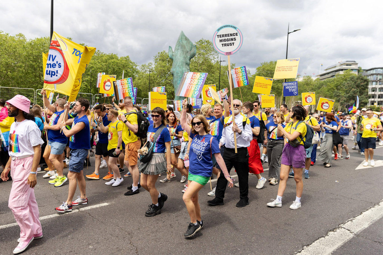 Terrence Higgins Trust representatives in a Pride Parade.