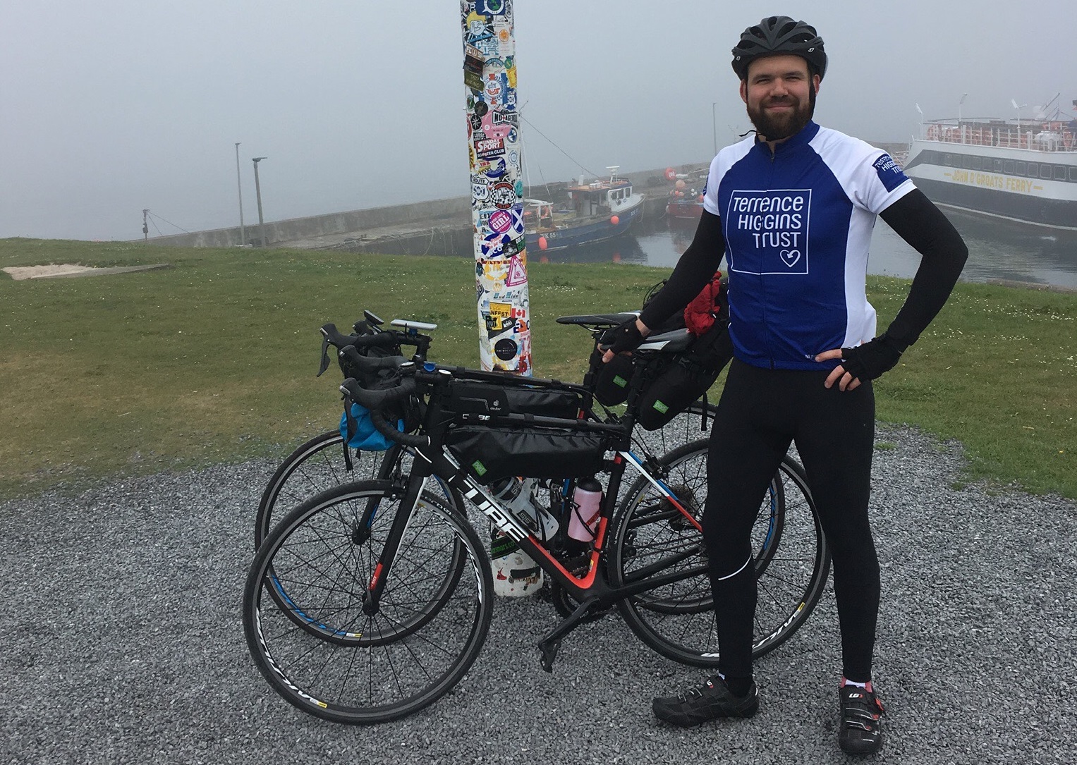 John O Groats, THT rider with bike John O Groats, THT rider with bike