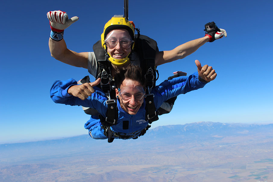 Two people skydiving