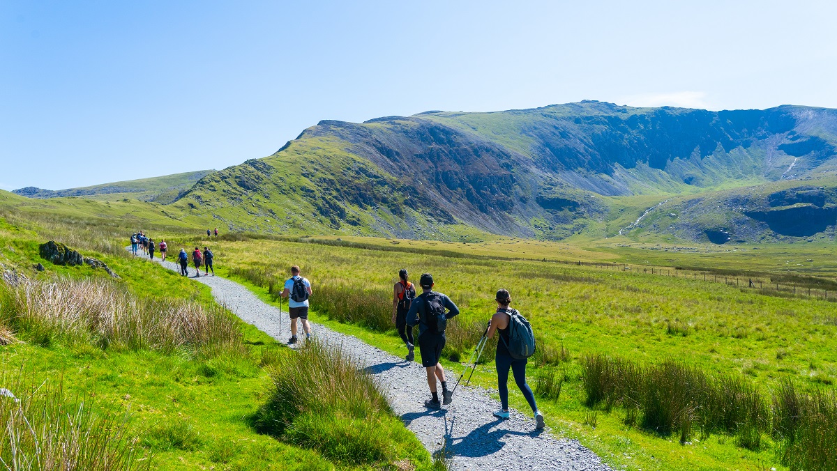 Walkers on a path during the Snowden Sea to Summit challenge