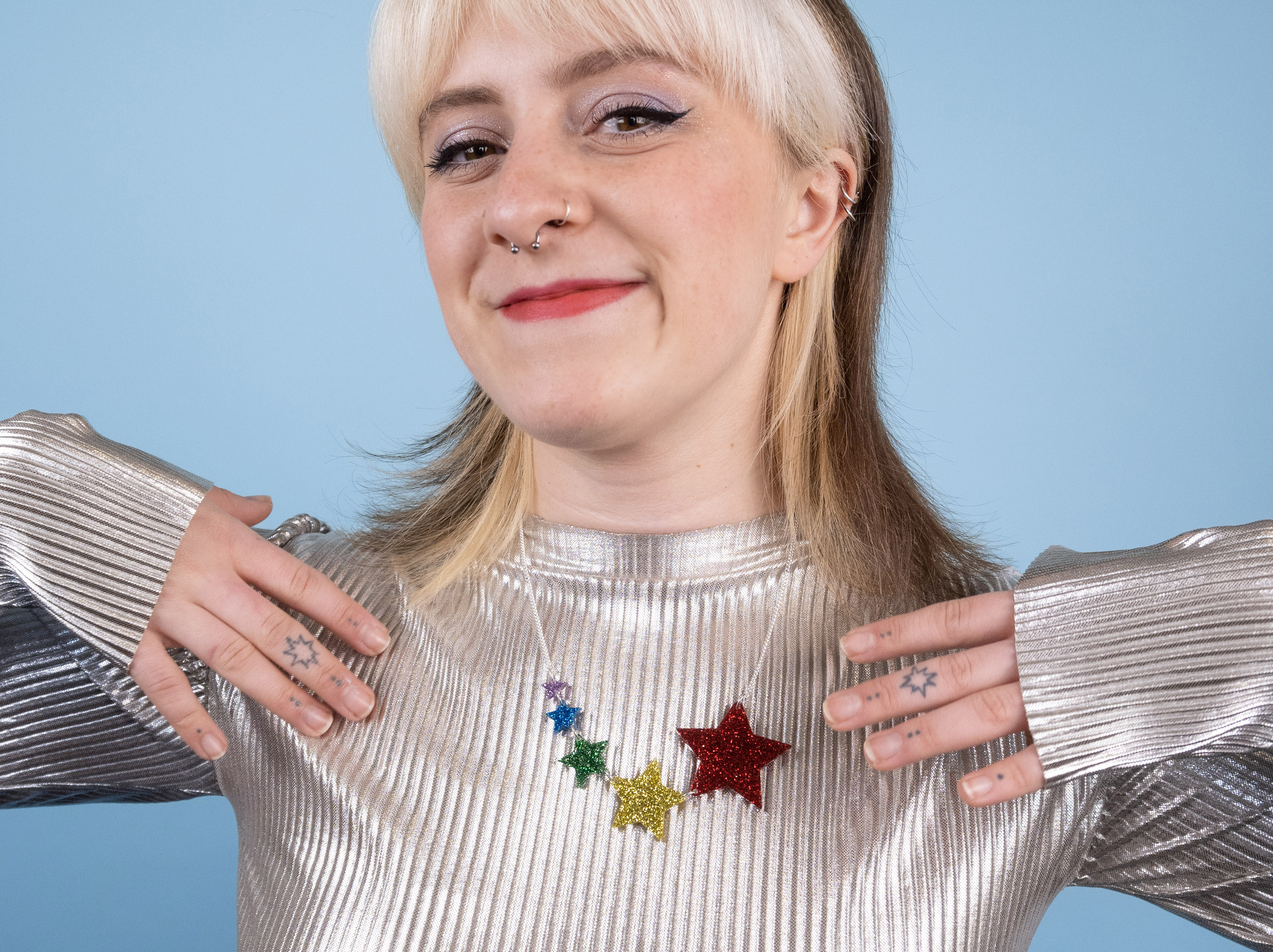Tatty Devine’s shooting star necklace, consisting of five stars of different colours