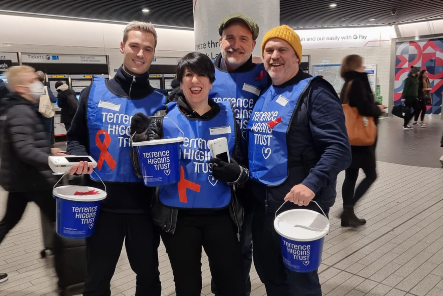 Tube station bucket collection with four people
