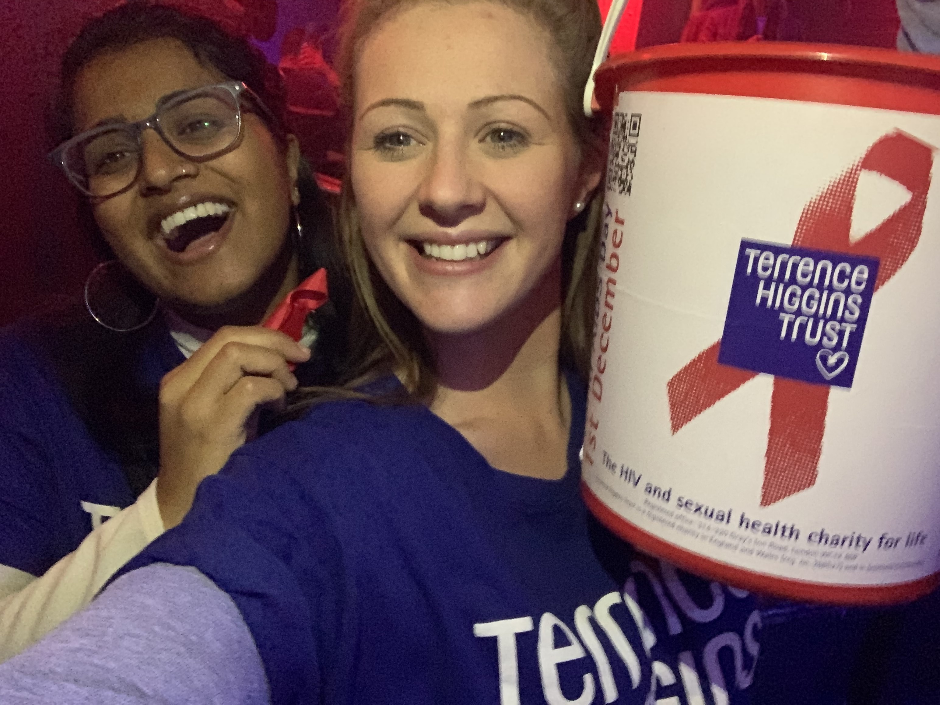 Selfie with bucket and red ribbon