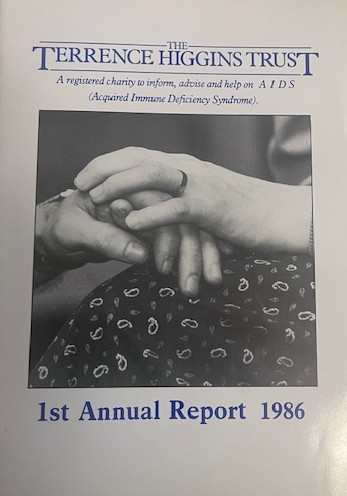 The front cover of THT's first annual report. There is an image of two hands and the text "1st Annual Report 1986" underneath