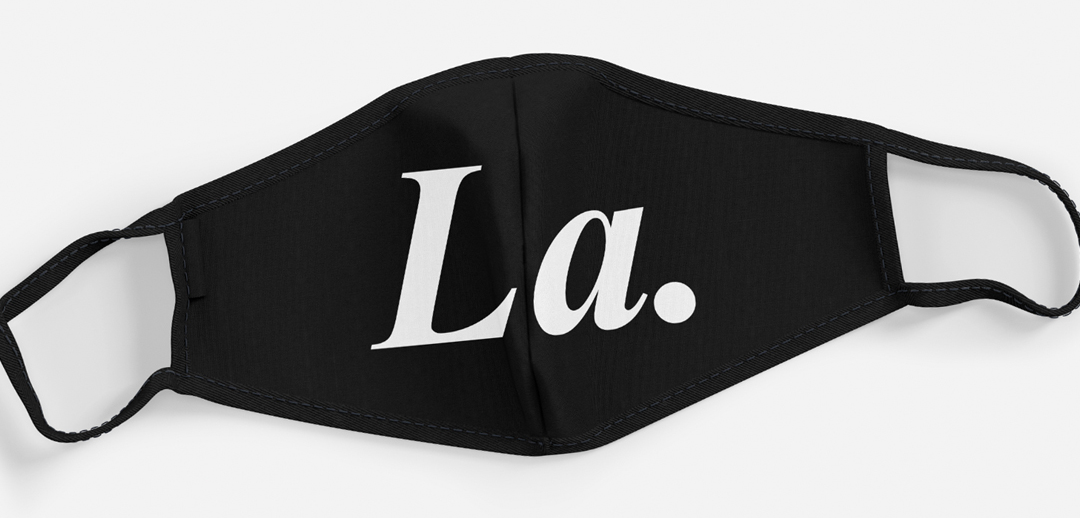 Black face mask with white 'La.' print