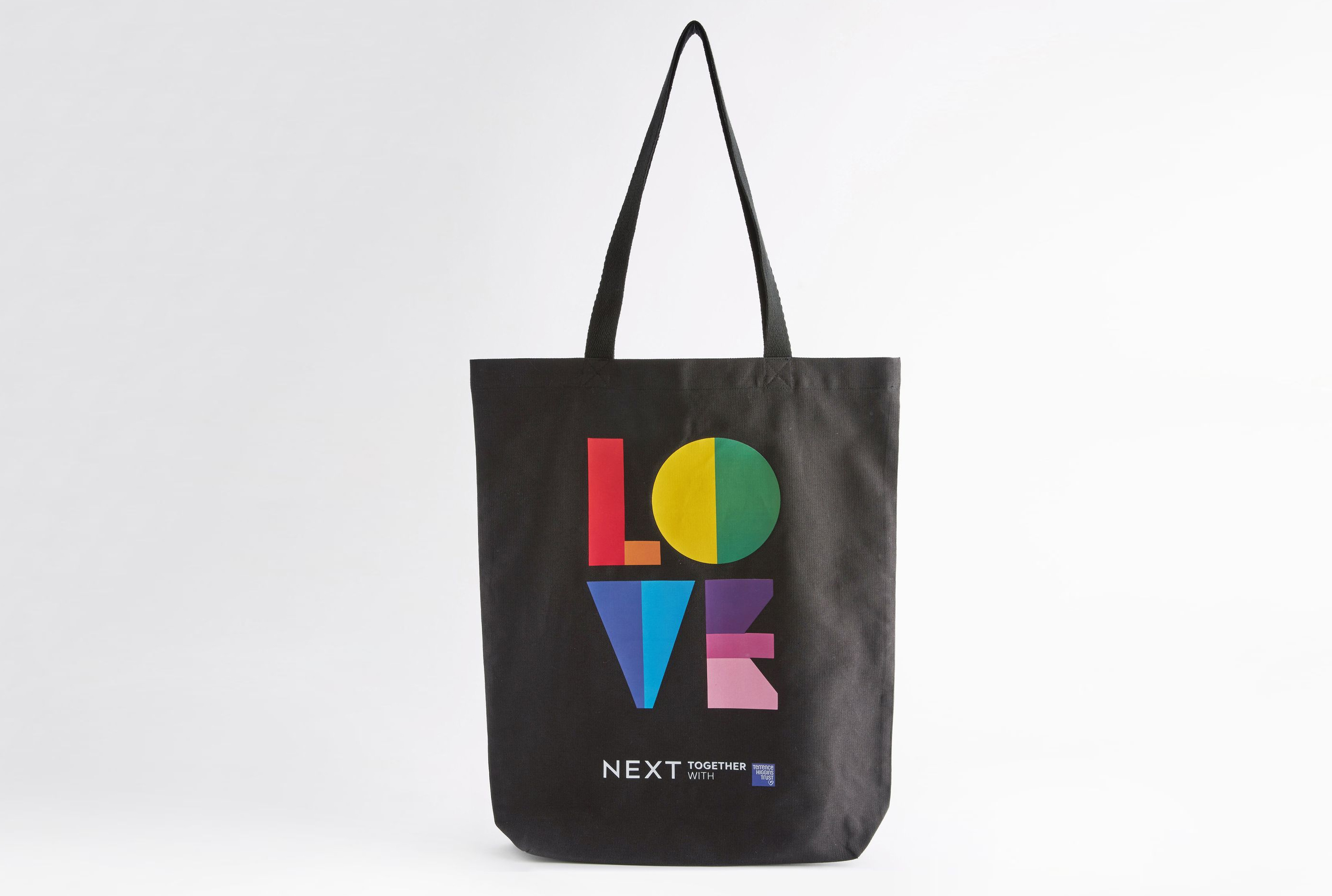 Tote bag with love written on it in pride flag colours