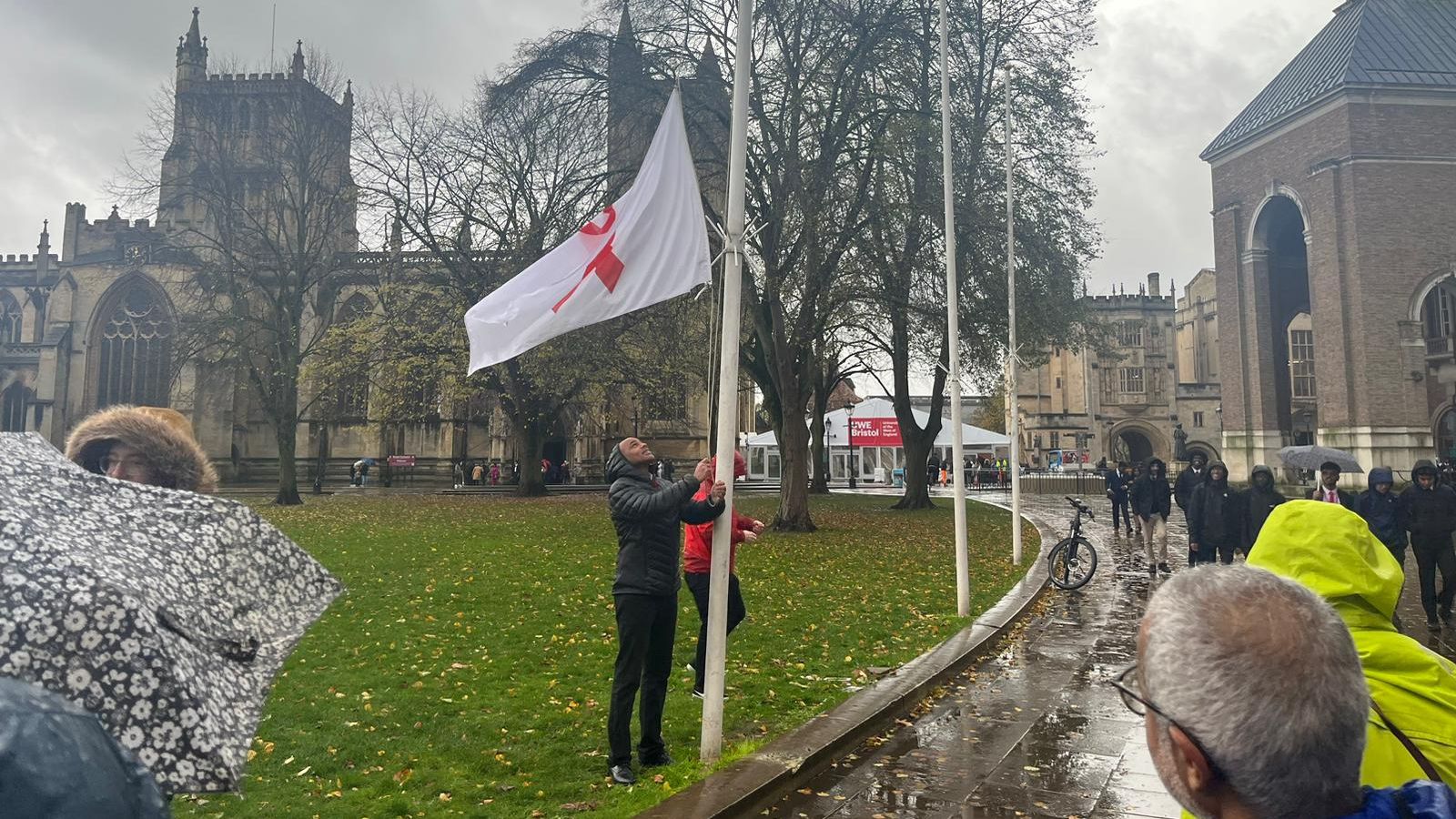 Marvin Rees putting up flag in Bristol