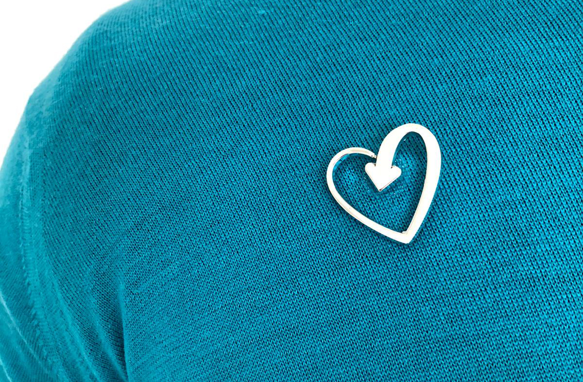 Terrence Higgins Trust heart pin badge
