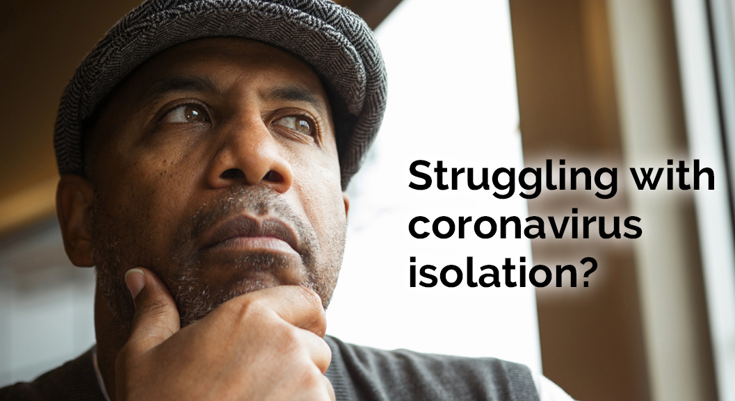 Man reflecting by window/Struggling with coronavirus isolation? Struggling with coronavirus isolation?