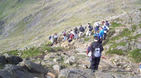 Line of people descending Snowdon Line of people descending Snowdon