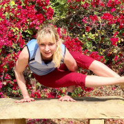 Volunteer Sabrina Jacobs doing yoga