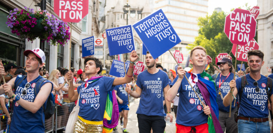 Marching with Can't Pass It On stop signs, Pride 2018 Marching with Can't Pass It On stop signs, Pride 2018