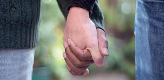 Holding hands close-up Holding hands close-up