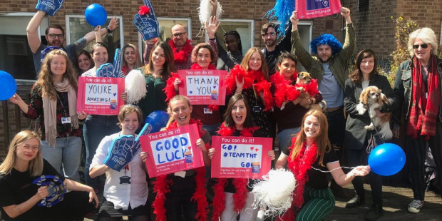Cheer squad with good luck banners, balloons Cheer squad with good luck banners, balloons