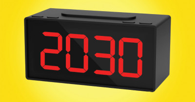Black digital clock showing 2030 in red figures