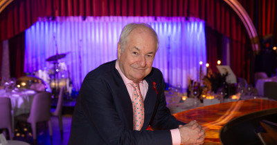 Paul Gambaccini at the bar at An Evening of Radio Magic - photo by Piers Allardyce