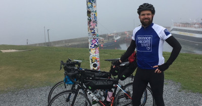 John O Groats, THT rider with bike John O Groats, THT rider with bike