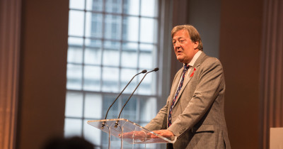 Stephen Fry making a speech