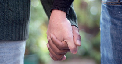 Holding hands close-up Holding hands close-up