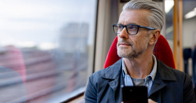 Man looking out of window Man looking out of window