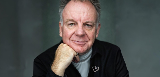 Paul Clayton wearing a heart badge