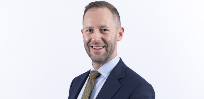 A professional headshot of Tomas Waite OBE. A professional headshot of Tomas Waite OBE.