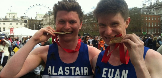 Runners with medals at London Marathon