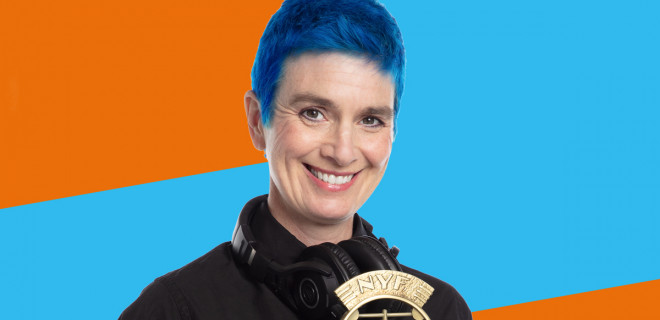 Anita holding an award