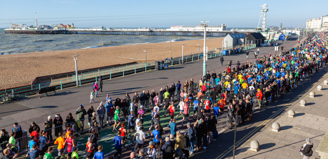 Brighton Half Marathon runners on seafront