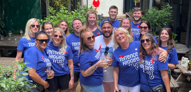 Volunteer Ambassador Frankie with a group of people wearing Terrence Higgins Trust T-shirts
