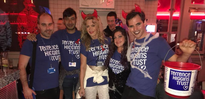 Volunteers fundraising in a bar