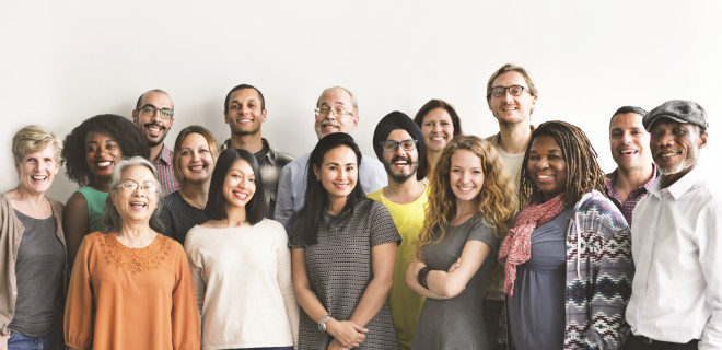 Positive Voices - studio pic of large group of smiling people