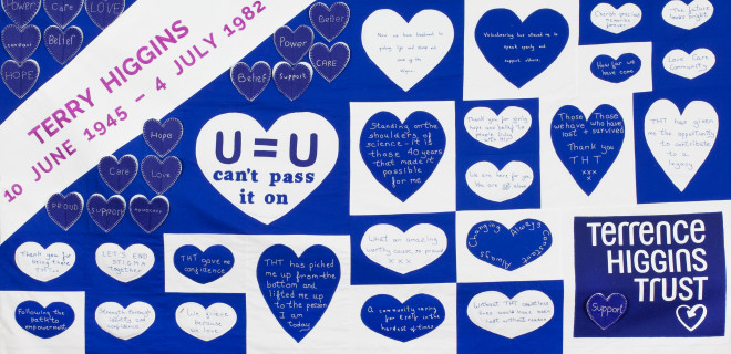 Terry Higgins Memorial Quilt panel with blue and white hearts and Terrence Higgins Trust logo