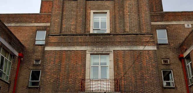 Building with "Central Health Clinic" above entrance