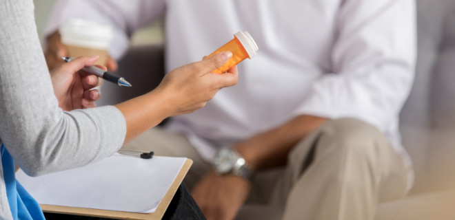 Two people talking about medication