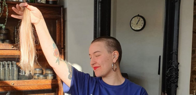 Volunteer fundraising ambassador Rosie and her shaved hair