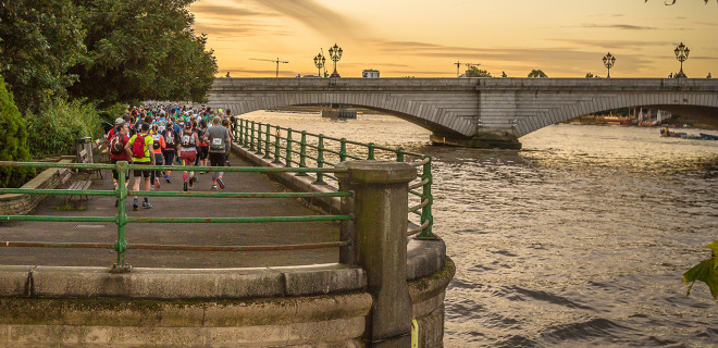 Thames Path Challenge bridge sunset with walkers