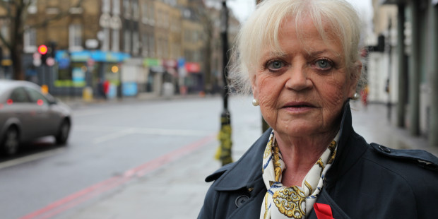 Lady wearing red ribbon