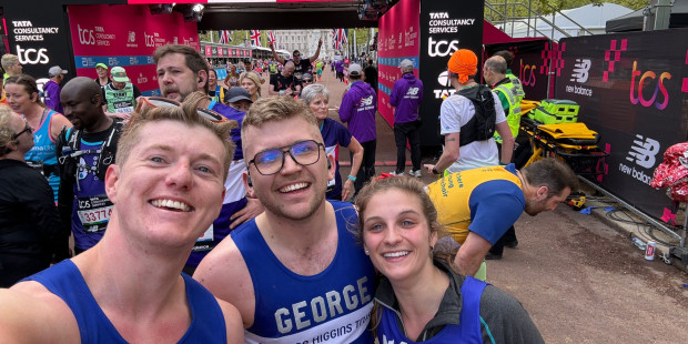 A selfie of three marathon runners representing Terrence Higgins Trust.