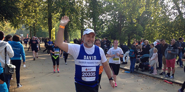 Runner David waving at the Royal Parks Foundation Half Marathon
