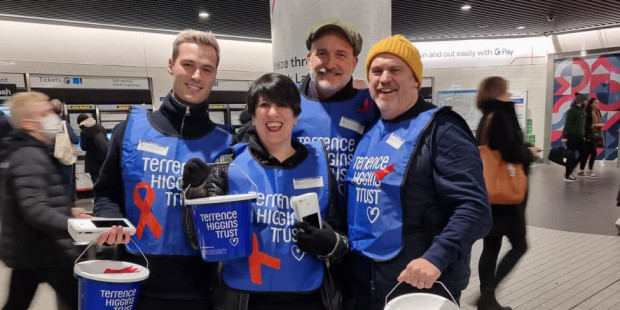 Tube station bucket collection with four people