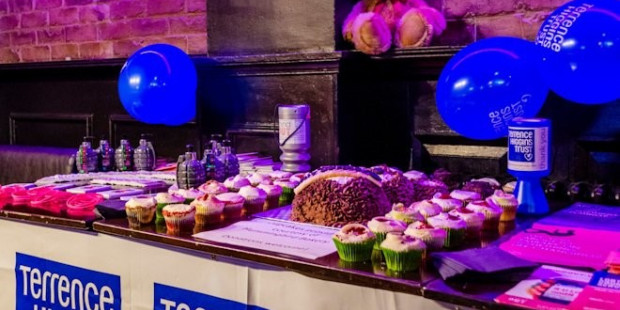 Fundraising stall with baked goods and are those grenades?