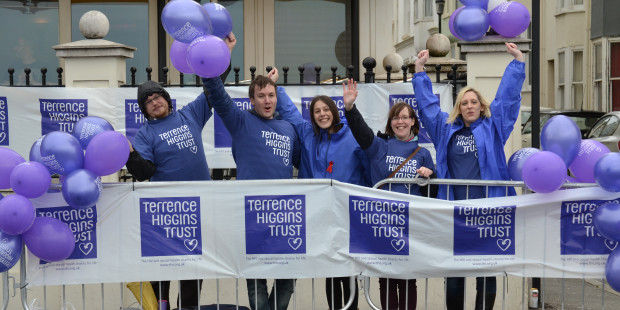 Terrence Higgins Trust staff and volunteers at an event cheerpoint