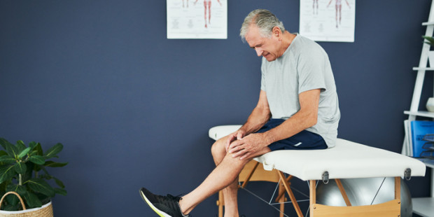 Man with knee raised Man with knee raised